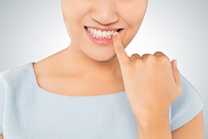 Woman Checking Teeth