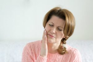 Woman With TMJ Pain