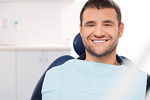 Smiling Man in Dental Office